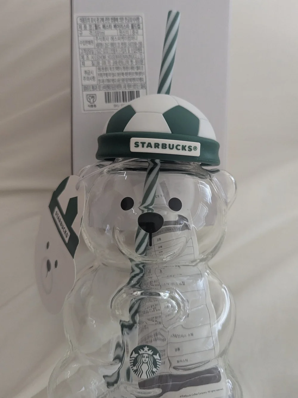 Limited Edition Starbucks Glass Bear Tumbler with Green & White Soccer Hat.